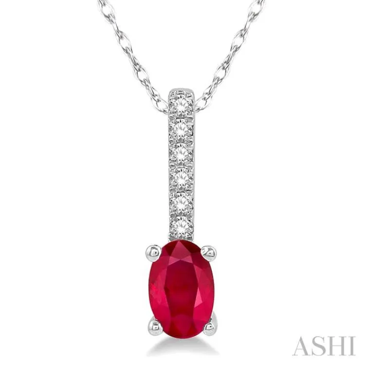 1/20 Ctw Round Cut Diamond and Oval Cut 6x4 MM Ruby Precious Pendant in 10K White Gold with chain