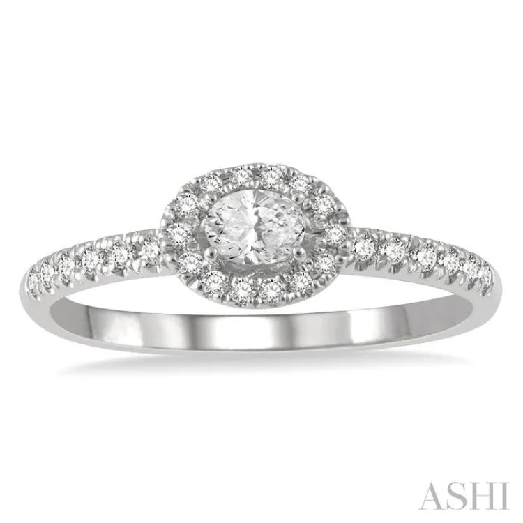 1/3 Ctw Oval Shape Round Cut Diamond Fashion Ring with 1/6 ct Oval Cut Center Stone in 14K White Gold