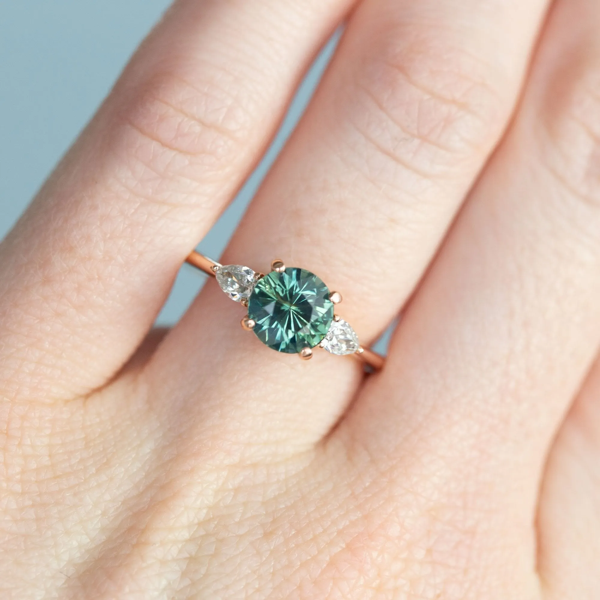 2.05ct Round Unheated Teal Green Sapphire With Pear Diamond Side Stones in 14k Rose Gold