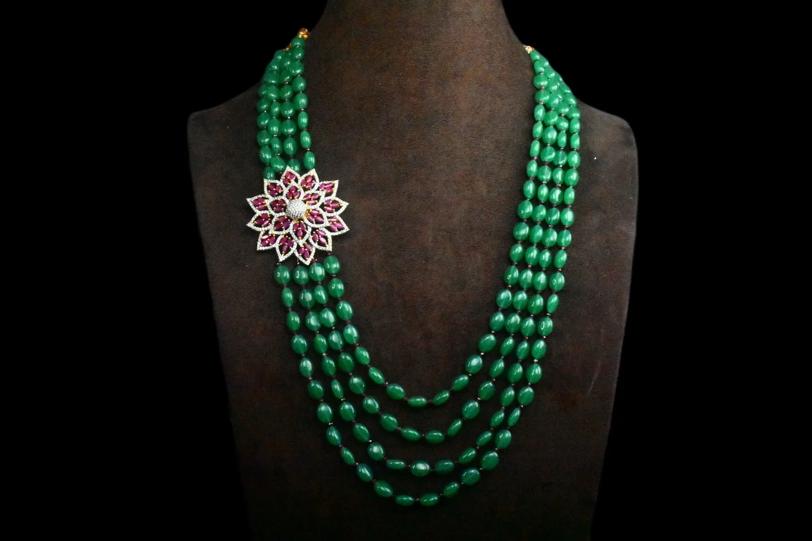 Multi Strand Emerald Beads Necklace With Side Pendant

By Asp Fashion Jewellery