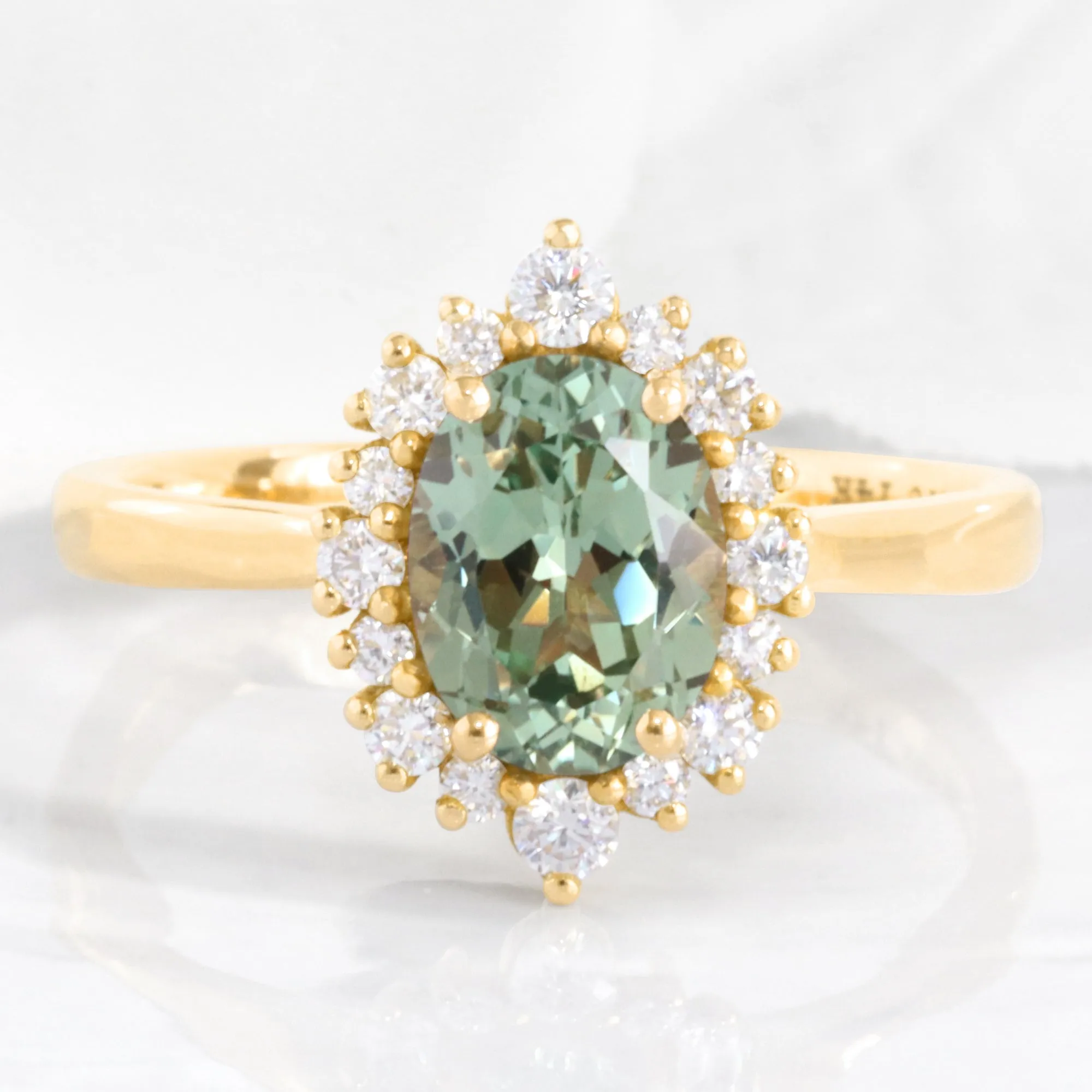 Oval Green Sapphire Engagement Ring in Tiara Halo Diamond Tapered Band