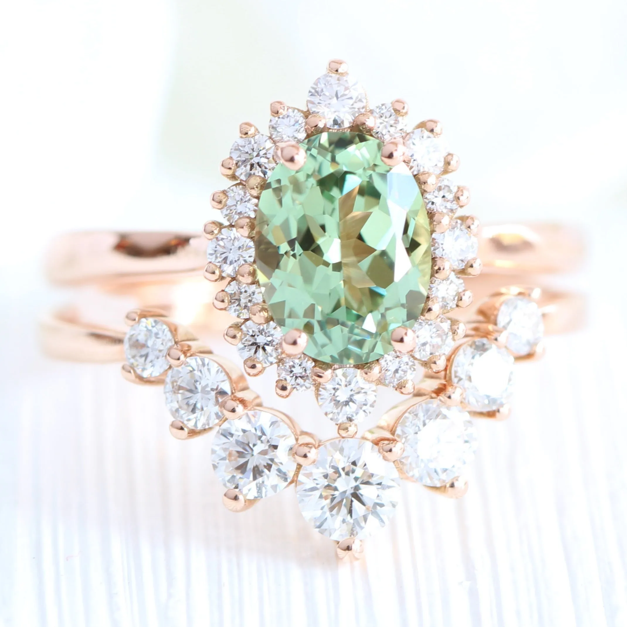 Oval Green Sapphire Engagement Ring in Tiara Halo Diamond Tapered Band