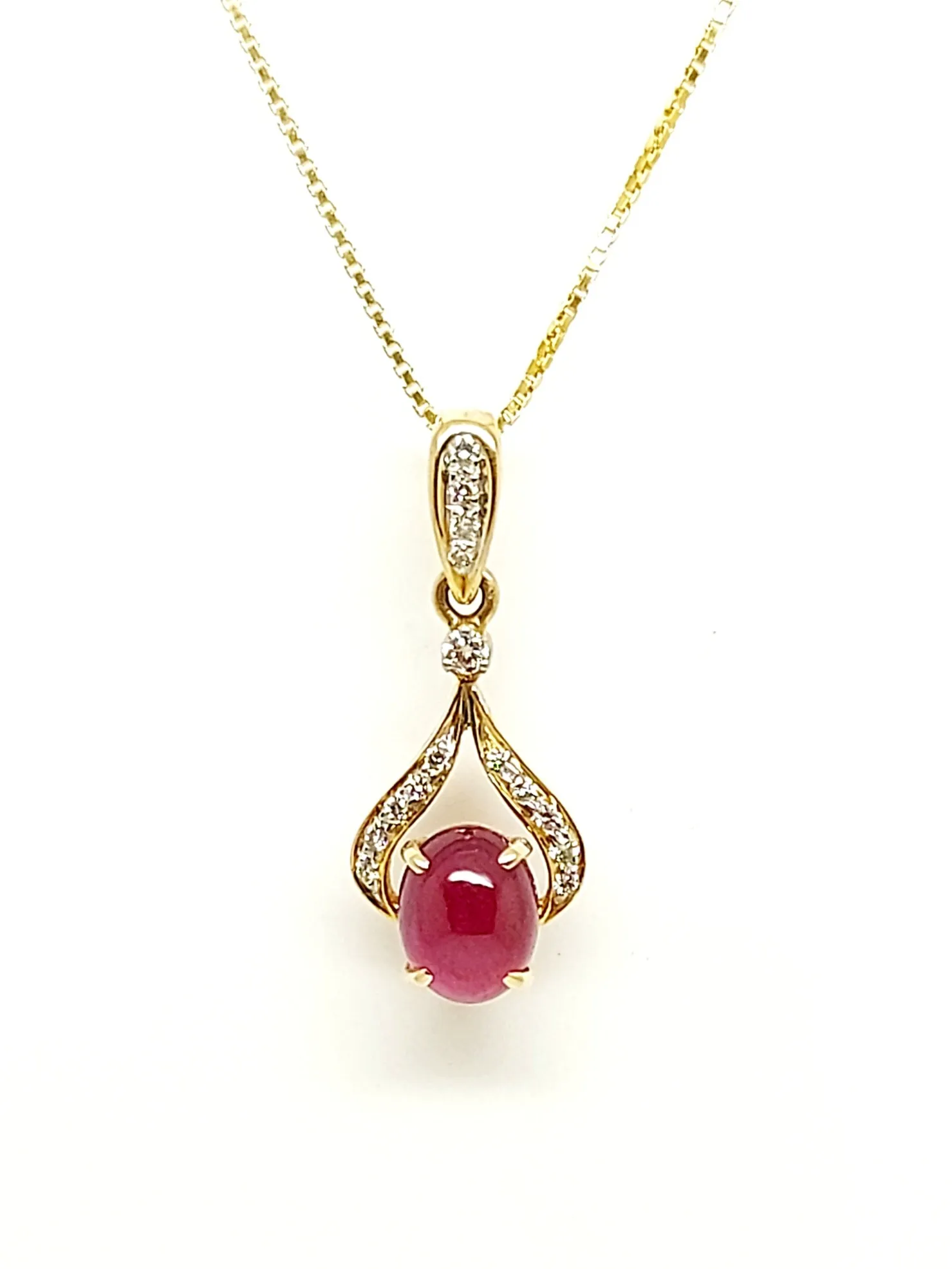 Oval Uncut Ruby Pendant With Diamond Bail In 14k Yellow Gold