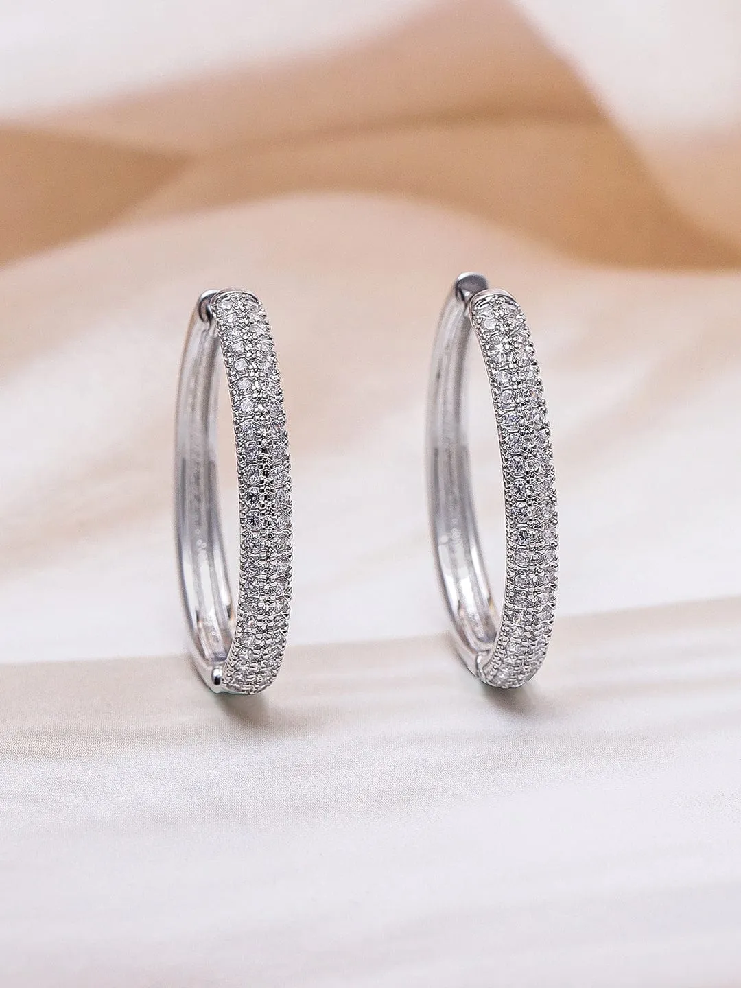 Rubans Rhodium Plated Sparkling Cubic Zirconia Studded Hoop Earrings