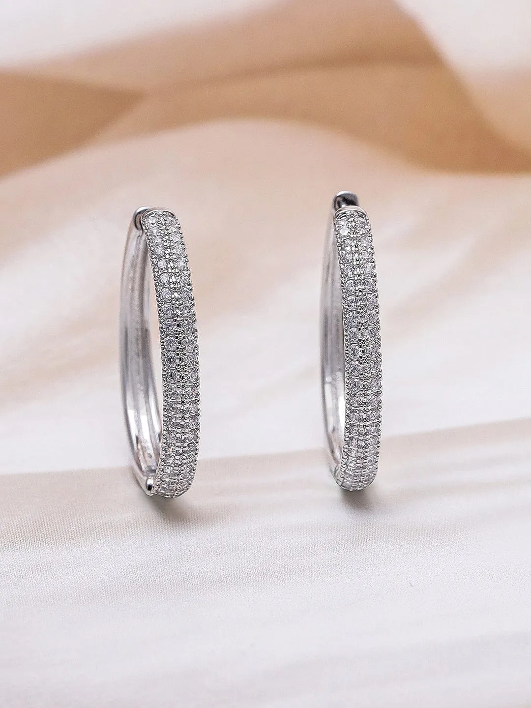 Rubans Rhodium Plated Sparkling Cubic Zirconia Studded Hoop Earrings